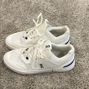 On Running White Sneakers with Blue Highlights